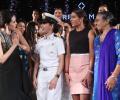 What's Karisma doing with naval officer Pooja Sharma?