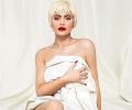 Kylie Jenner poses in a bedsheet