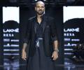 Shikhar Dhawan walks the ramp at Lakme Fashion Week