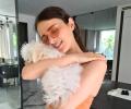 Radhika cuddles up with her pet