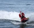 Santa Arrives On A Jet Ski Instead Of Sleigh