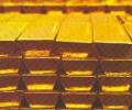 Gold plunges on heavy selling, silver slips