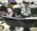 Markets take a breather on weak global cues