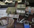 FM asks I-T dept to unearth black money in India