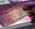 Rupee snaps 4-day rally, down at 55.50