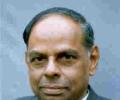 Govt determined to contain fiscal deficit: Rangarajan