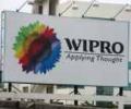 Wipro promoters to cut stake via auction