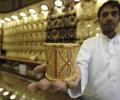 Gold ends steady at Rs 28,000 per gm; silver inches up