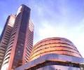 Markets end flat as Asian cues weigh