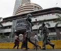 Markets end lower as global stocks tumble; TCS Q2 results eyed