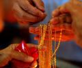 Gold rises on positive global cues, jewellers buying