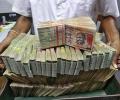 Rupee hits four-month peak as shares hit record