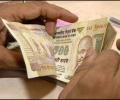 Rupee down 5 paise against USD in morning trade