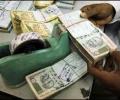 Rupee up by 24 paise vs dollar in late morning trade