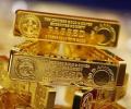 Gold eases on sluggish demand, global cues