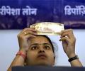 Rupee down 29 paise on heavy dollar demand