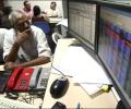 Sensex ends in red; RBI policy eyed