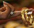 Gold zooms by Rs 380 on wedding season demand, firm global cues