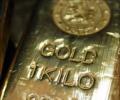 Gold, silver fall on stockists selling, global cues