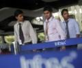 Infosys shares closed 1% up on subdued FY'15 revenue guidance