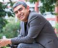 Infosys extends Sikka's term, raises base salary to $1 million