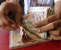 Rupee snaps two-day fall as exporters, corporates sell dollars