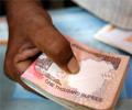 Rupee up 6 paise against dollar in early trade