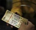Rupee down 8 paise against dollar in early trade