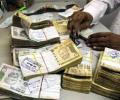 Rupee snaps two-day fall as shares gain