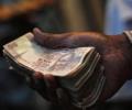 Rupee up 4 paise against dollar in early trade