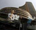 Sensex ends flat amid choppy trade; Nifty above 7,500