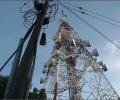 Why is spectrum auction a bonanza for tower companies?