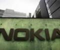Nokia says Microsoft deal to be delayed by a month