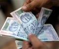 Rupee hits near 10-month peak before RBI's hand pulls it off