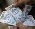 Rupee at 11-month high vs dollar