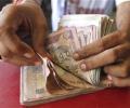 Rupee falls on month-end importer demand, weak shares hurt