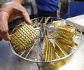 Gold, silver at multi-year lows on overseas cues