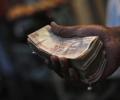 Rupee rebounds from 9-month low to end at 61.94