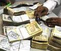 Rupee ends almost flat on Asian cues