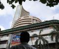 Sensex drops 297 points; Infosys slumps 6% on muted guidance