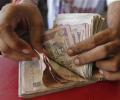 Rupee snaps 2-day fall, recovers 8 paise against dollar