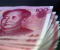 Yuan devaluation to hit firms with foreign loan exposure