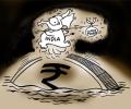 Rupee rebounds from 2-year lows to end at 66.92 vs USD