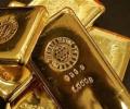 Gold eases on subdued demand; silver ends steady