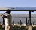 India builds solar plants atop canals to save land, water