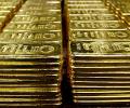 Gold extends losses on global cues, sluggish demand