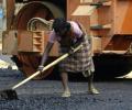 Modi takes the wheel as India's road building stimulus bogged down