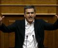 Greek PM keeps lid on party rebellion to pass bailout vote