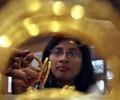 Gold, silver turn weak on global cues, sluggish demand