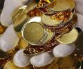 Gold near 2-week low as Fed puts Dec rate hike in play